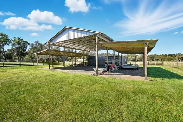 a view of a garden with an outdoor space