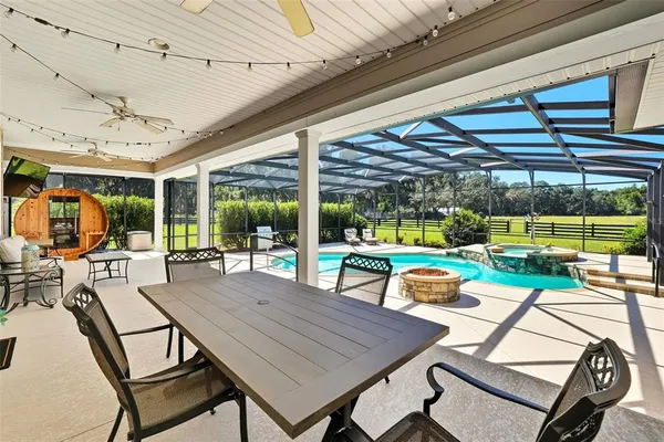 a outdoor space with patio lots of furniture and garden view