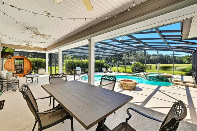 a view of living room kitchen and entryway