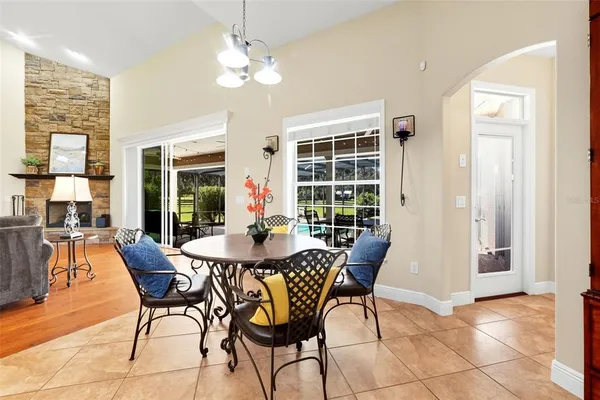 a view of a dining room with furniture window and outside view