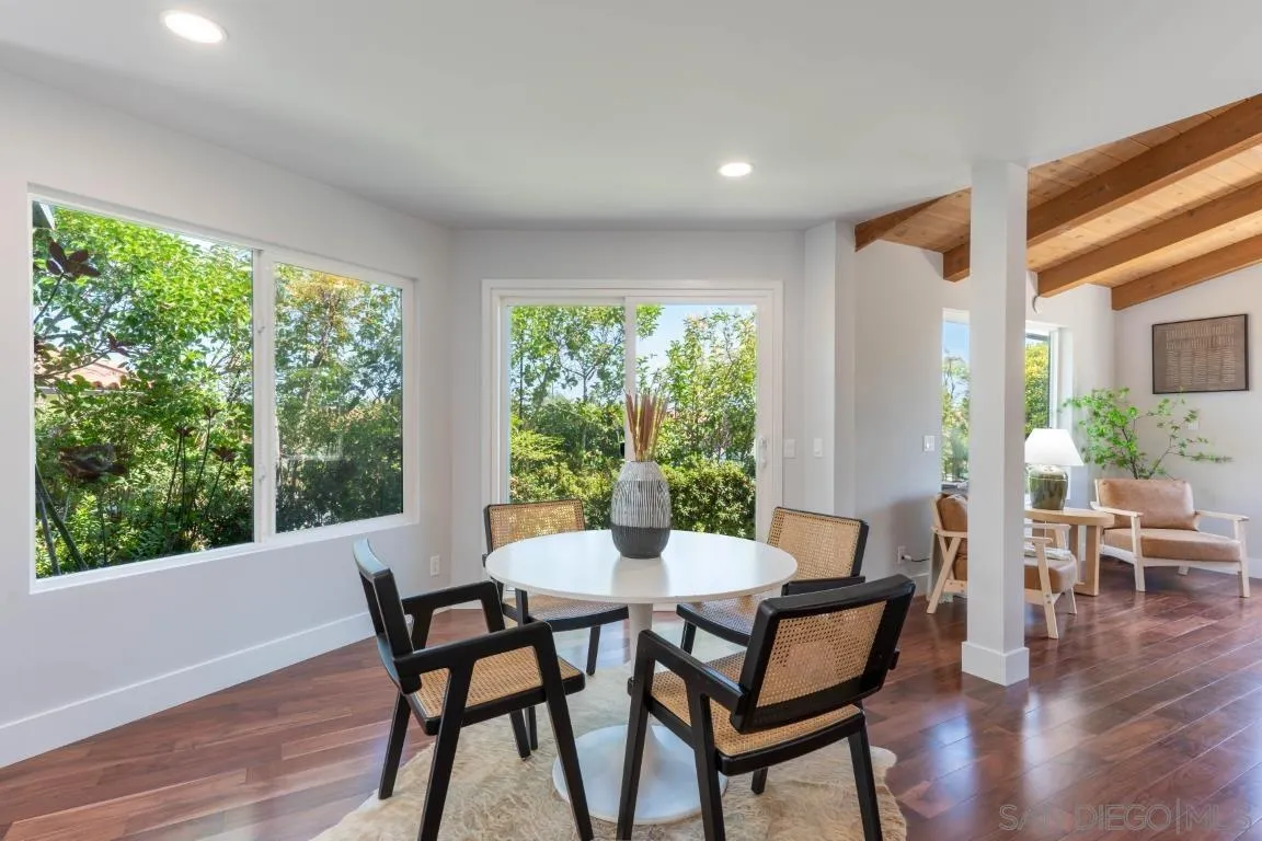 907 Ridge Heights Drive Fallbrook, CA 92028 - Photo 13 of 70 a view of a dining room with furniture and wooden floor