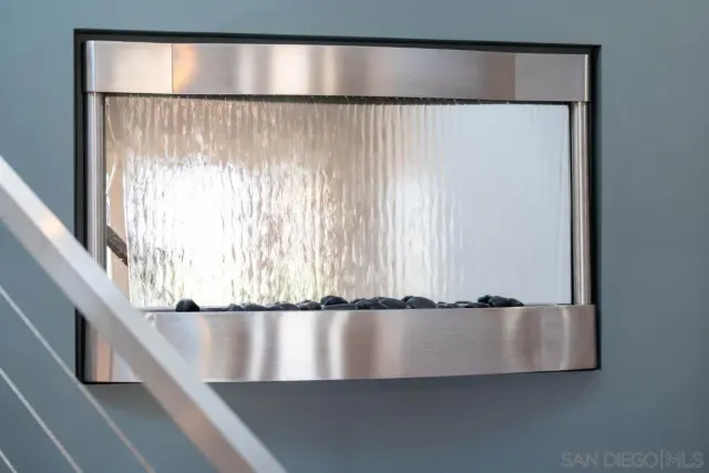 a white bath tub sitting next to a bathroom