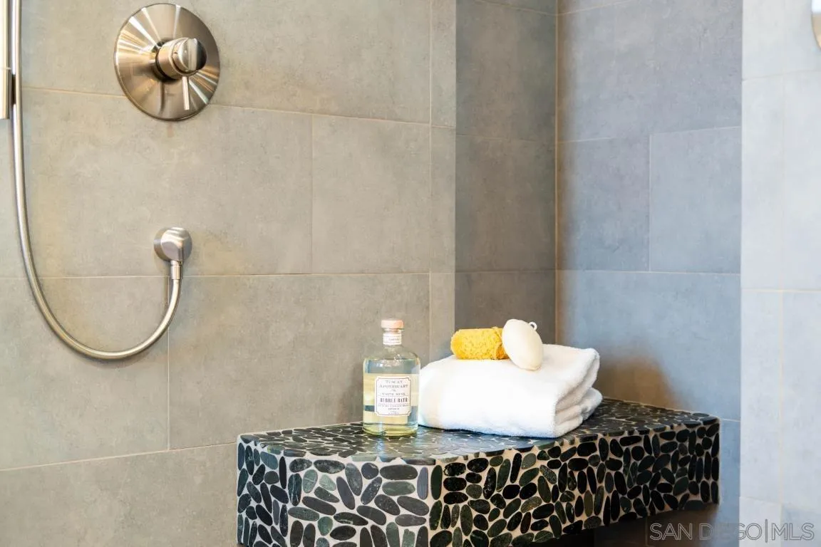 907 Ridge Heights Drive Fallbrook, CA 92028 - Photo 25 of 70 a bathroom with a sink and a mirror