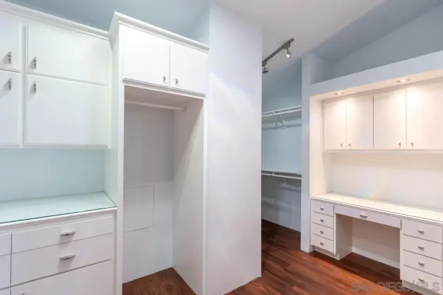 a bathroom with a double vanity sink mirror double shower