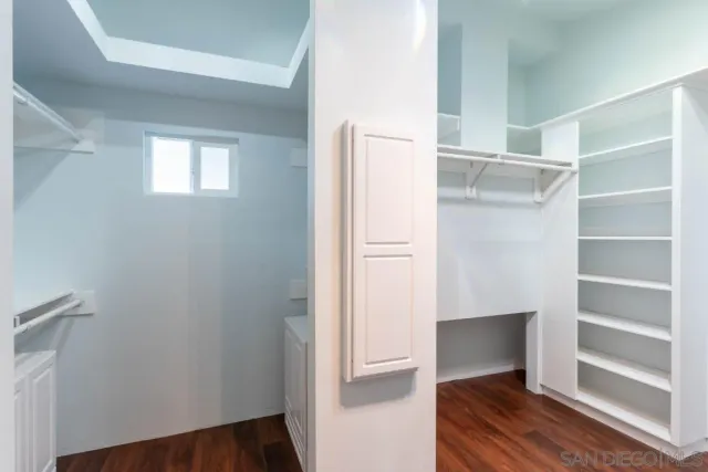 a workspace with furniture and a window