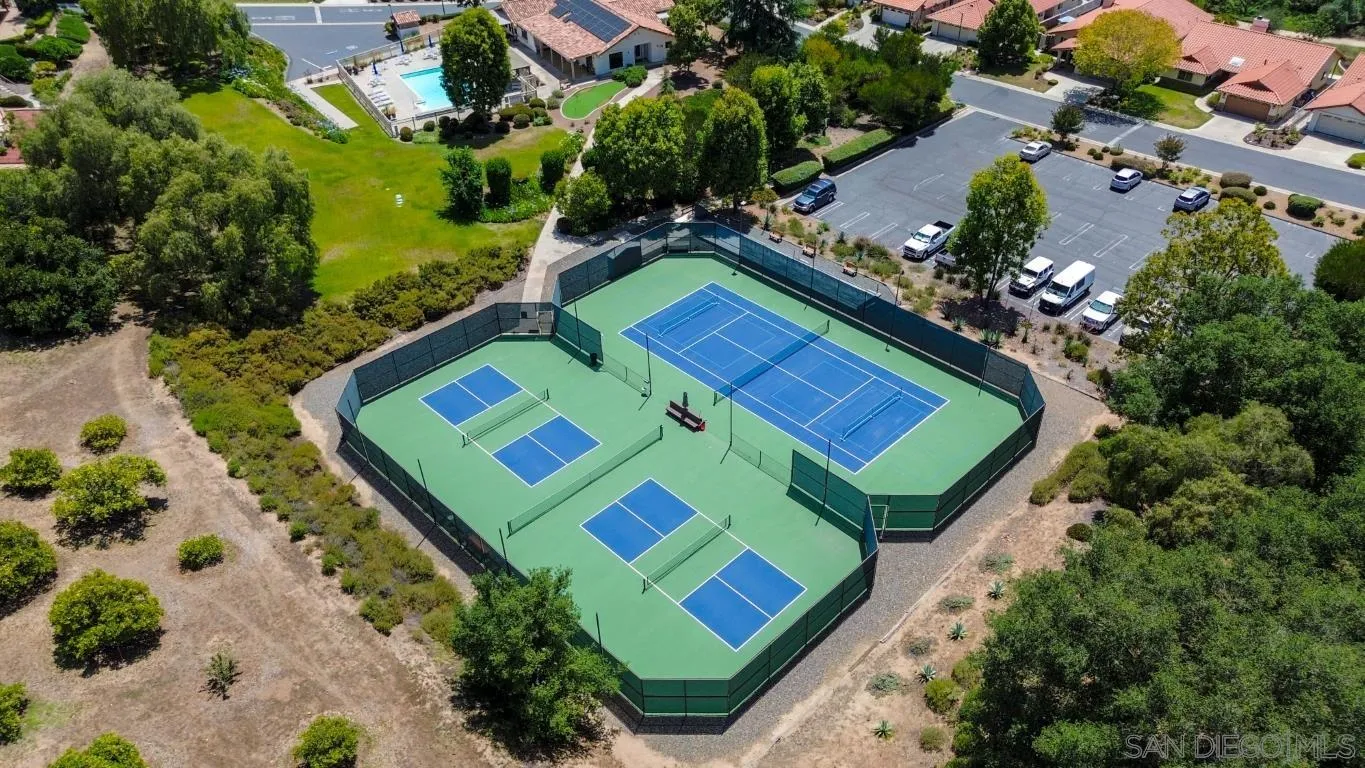 907 Ridge Heights Drive Fallbrook, CA 92028 - Photo 61 of 70 an aerial view of a tennis ground with a lake view