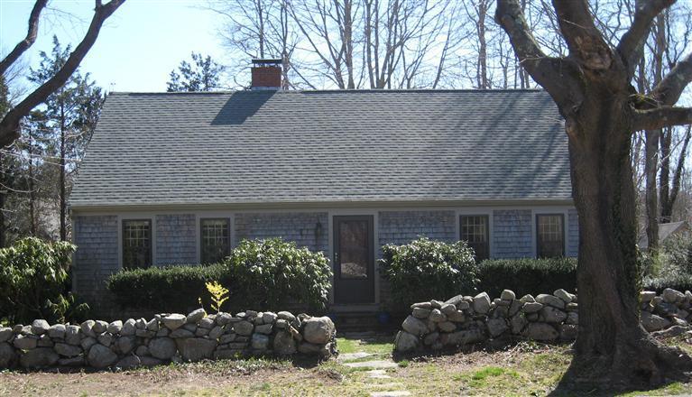 10 Chase Road Falmouth, MA 02540 - Photo 1 of 19 a view of a house with a yard