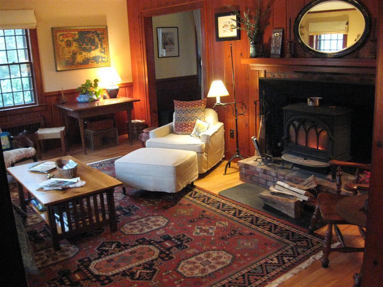 10 Chase Road Falmouth, MA 02540 - Photo 3 of 19 a living room with furniture and a fireplace