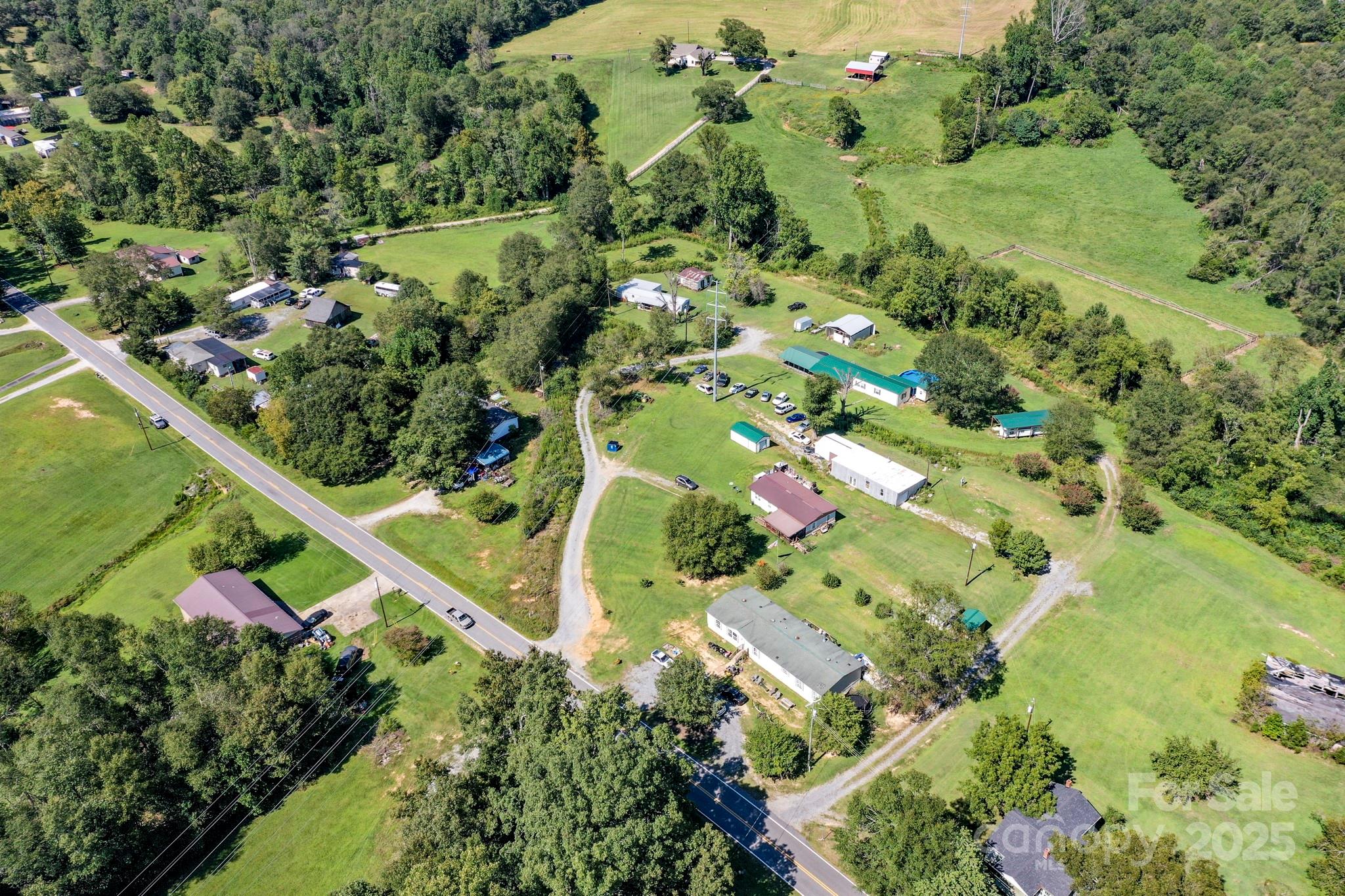 827 Old Henrietta Road Forest City, NC 28043 - Photo 13 of 18 an aerial view of a houses with a yard