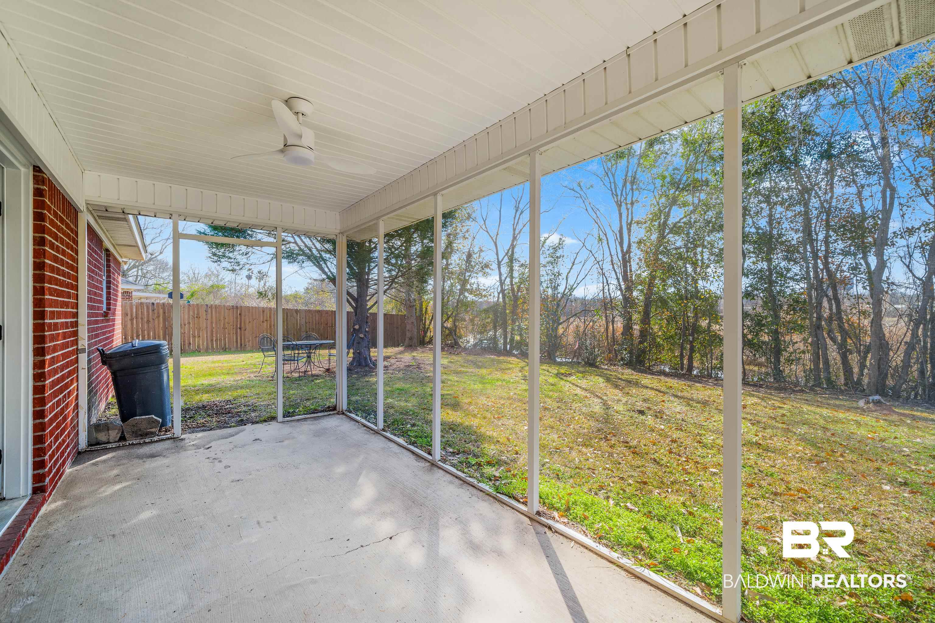 9243 Brookshire Loop Daphne, AL 36526 - Photo 20 of 26 Unfurnished sunroom featuring ceiling fan