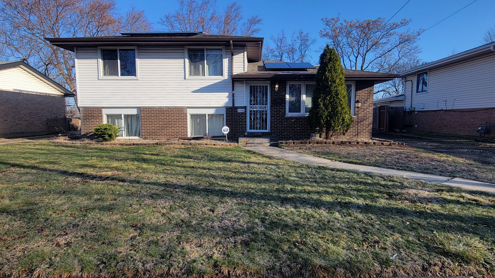 6546 107th Street Chicago Ridge, IL 60415 - Photo 1 of 1 a view of a house with a backyard