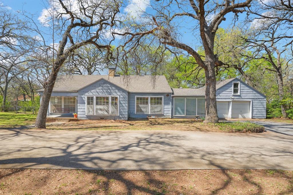 825 Sam Calloway Road Fort Worth, TX 76114 - Photo 1 of 1 Single story home with a chimney, driveway, and a garage