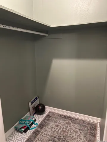 a bathroom with a sink toilet and mirror