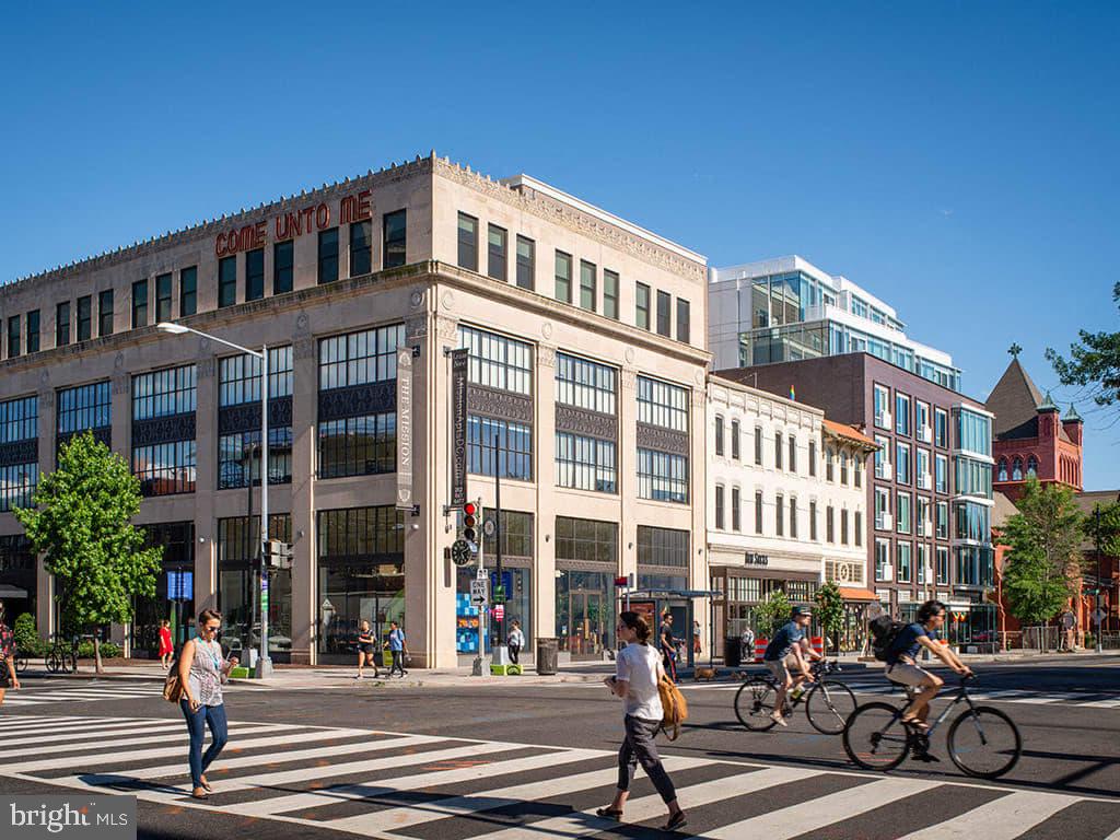a city street lined with tall buildings