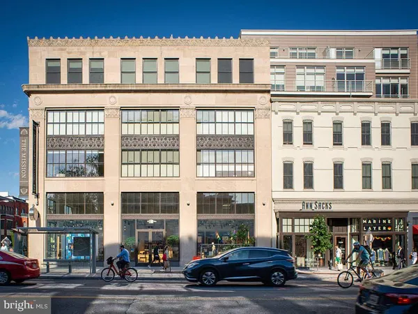 a car parked in front of a building