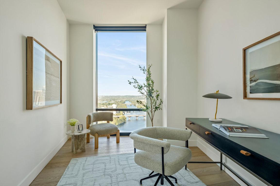 70 Rainey Street, Unit 2701 Austin, TX 78701 - Photo 15 of 40 a living room with furniture and a window
