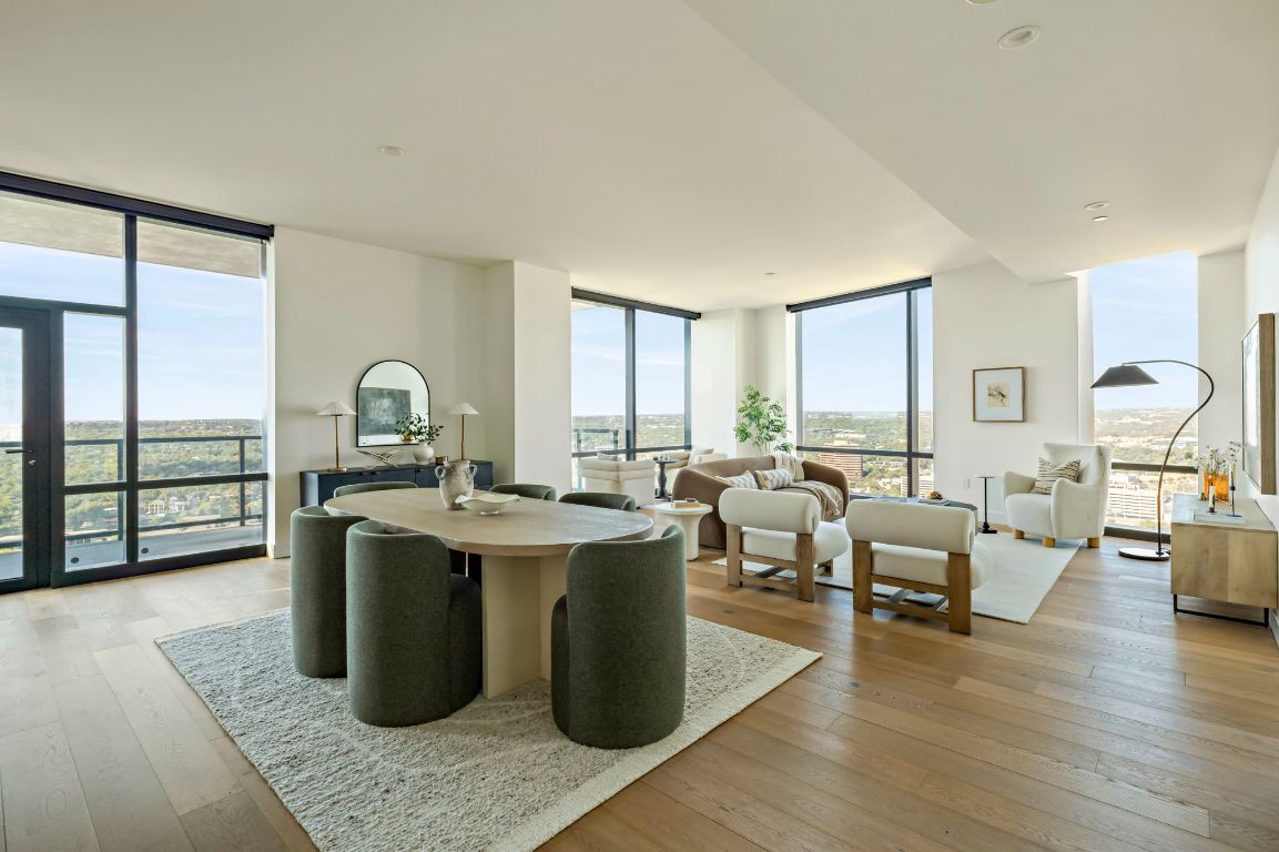 70 Rainey Street, Unit 2701 Austin, TX 78701 - Photo 2 of 40 a view of kitchen with stainless steel appliances granite countertop sink stove and wooden floor