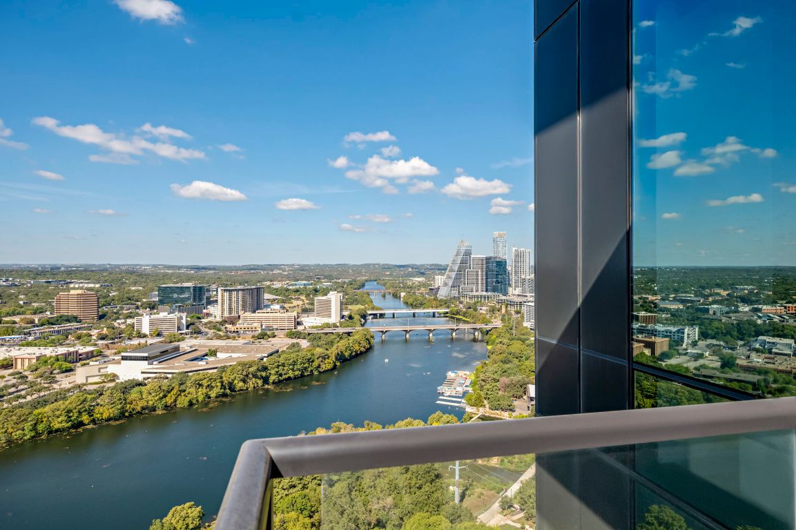 70 Rainey Street, Unit 2701 Austin, TX 78701 - Photo 28 of 40 a view of a lake from a balcony
