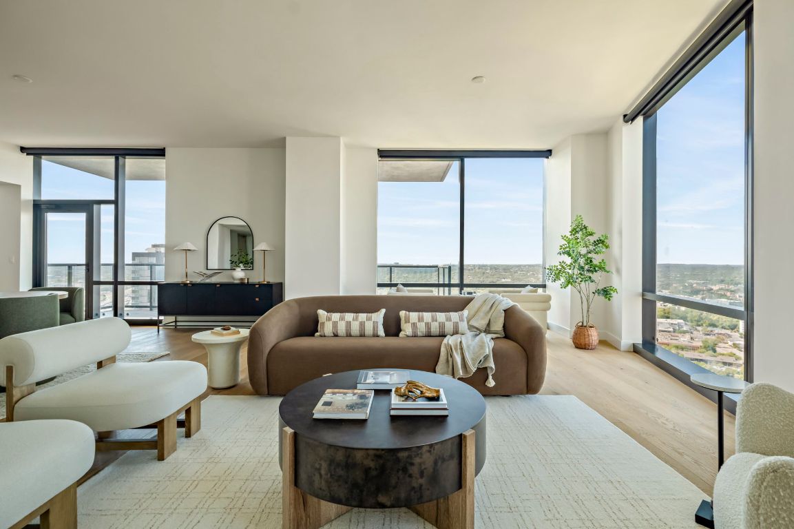 70 Rainey Street, Unit 2701 Austin, TX 78701 - Photo 5 of 40 a living room with furniture and a large window