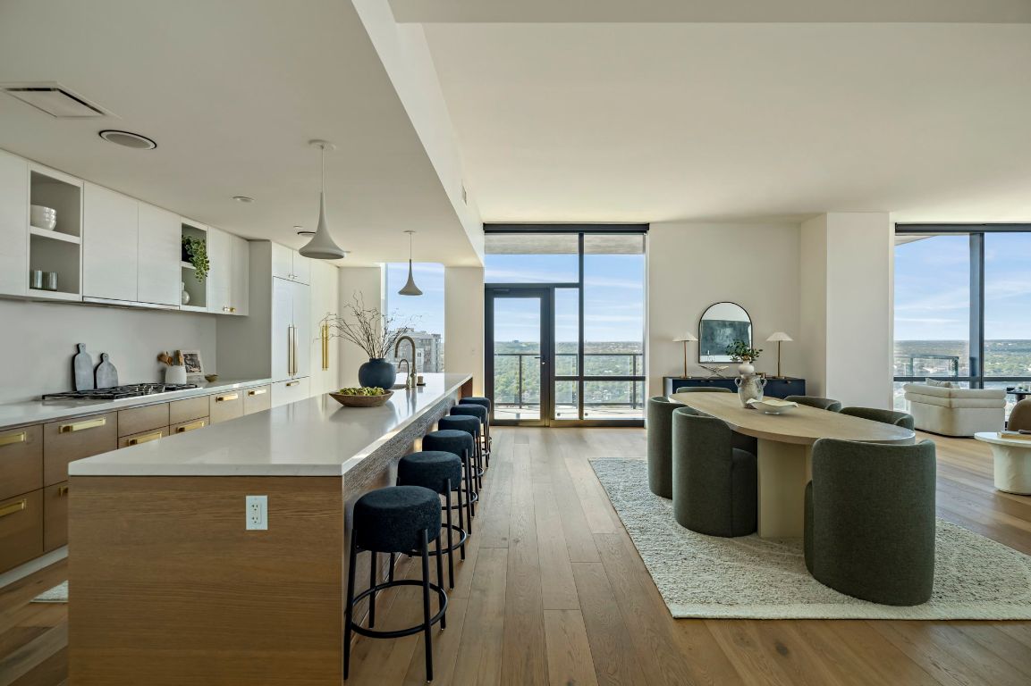 70 Rainey Street, Unit 2701 Austin, TX 78701 - Photo 10 of 40 a kitchen with a sink appliances and cabinets