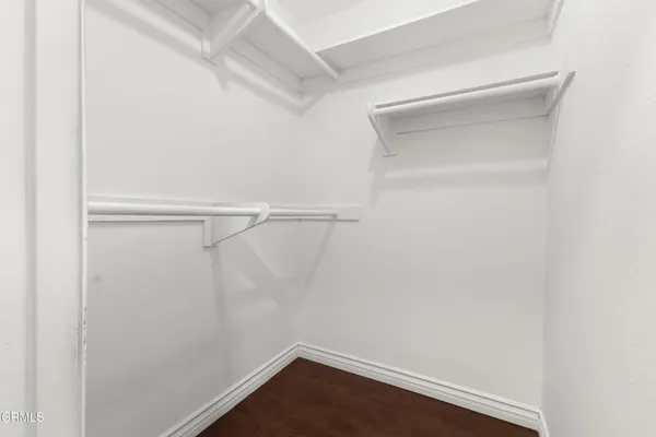 a view of an empty walk in closet