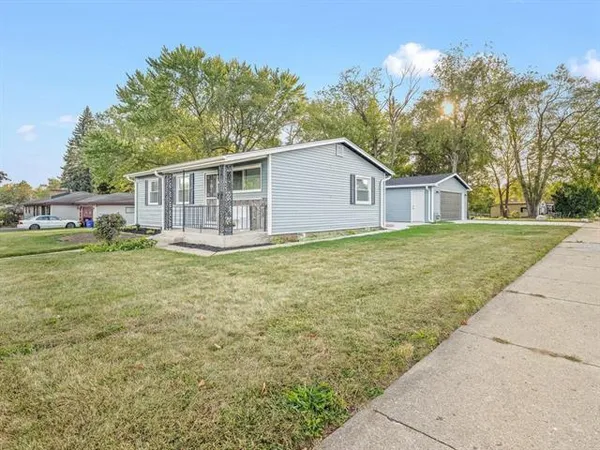 a view of a house with a patio