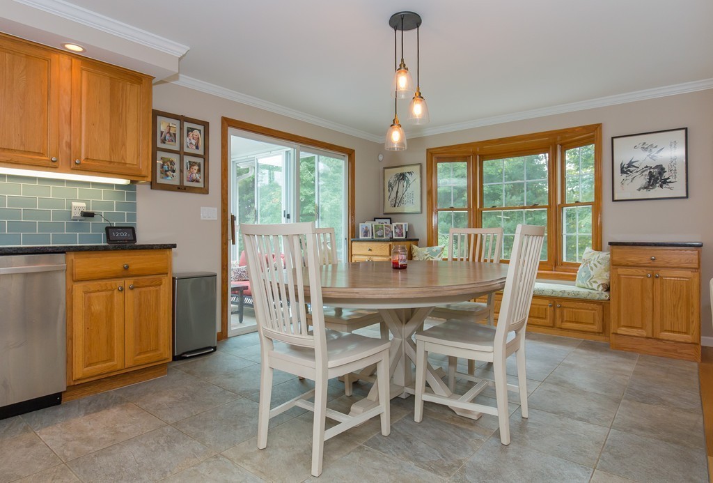 20 Gov Doherty Road Billerica, MA 01821 - Photo 8 of 30 a dining room with furniture a chandelier and wooden floor