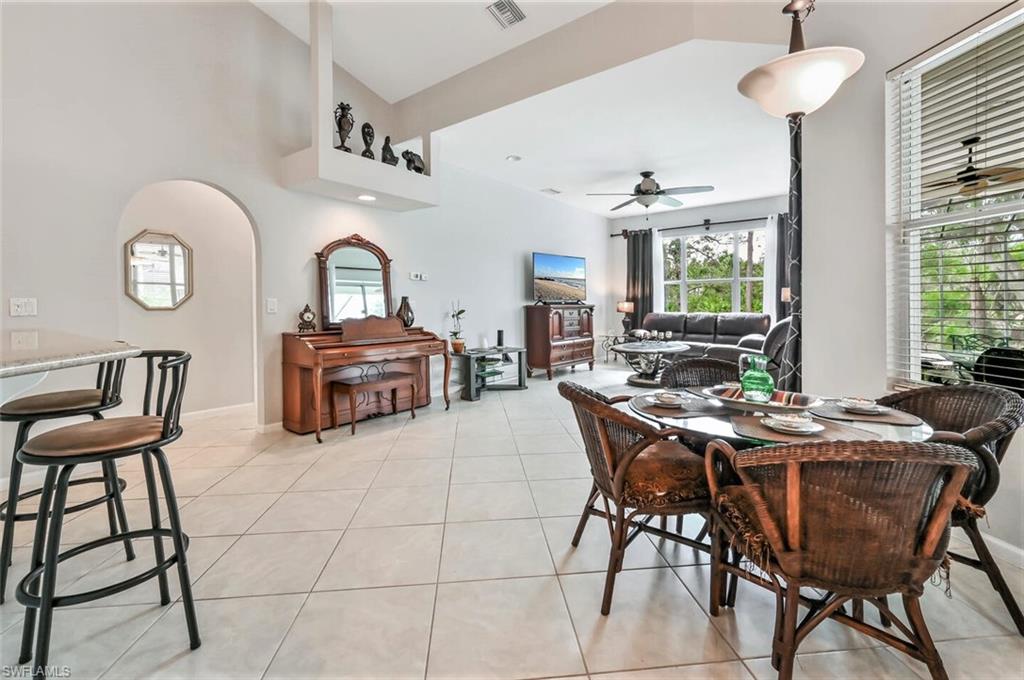 6545 Chestnut Circle Naples, FL 34109 - Photo 15 of 43 a view of a livingroom with furniture and window