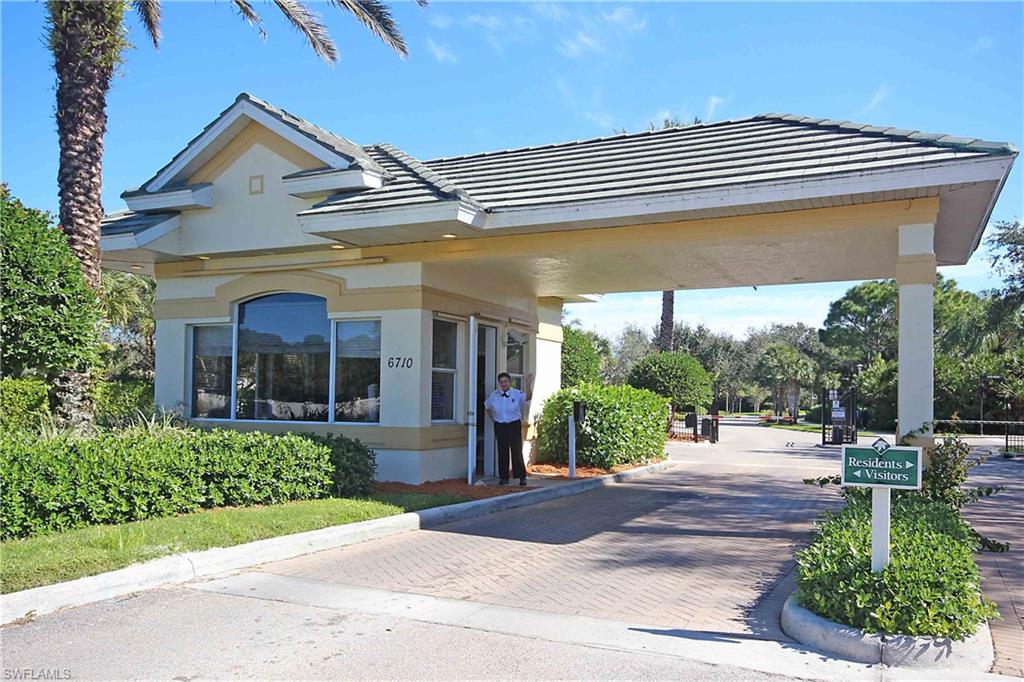6545 Chestnut Circle Naples, FL 34109 - Photo 3 of 43 a view of a building with a garden