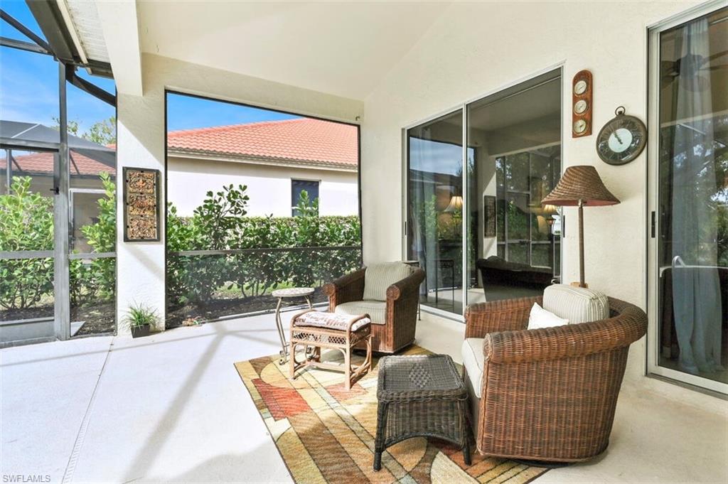 6545 Chestnut Circle Naples, FL 34109 - Photo 31 of 43 a living room with furniture and a window