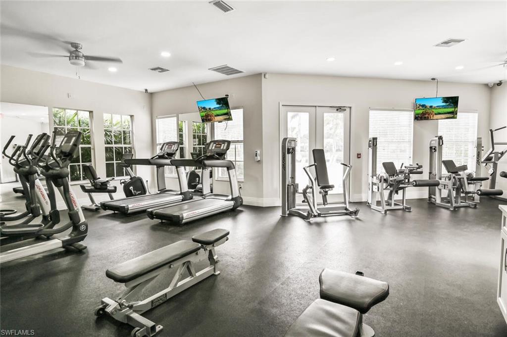 6545 Chestnut Circle Naples, FL 34109 - Photo 37 of 43 a view of a room with gym equipment