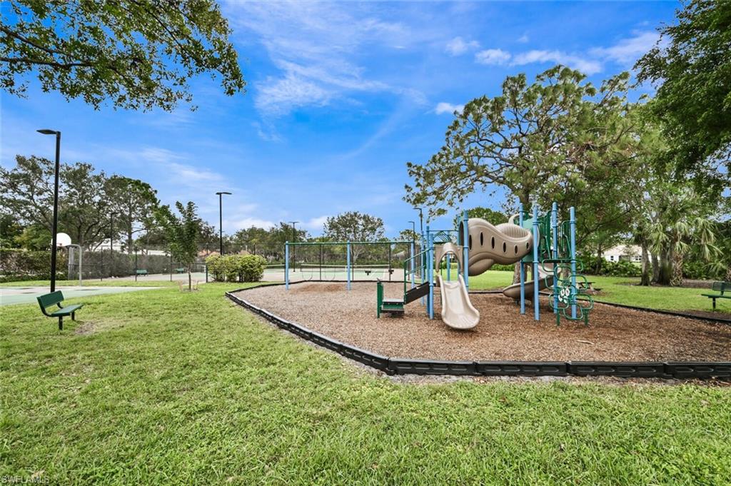 6545 Chestnut Circle Naples, FL 34109 - Photo 38 of 43 a view of outdoor space with seating