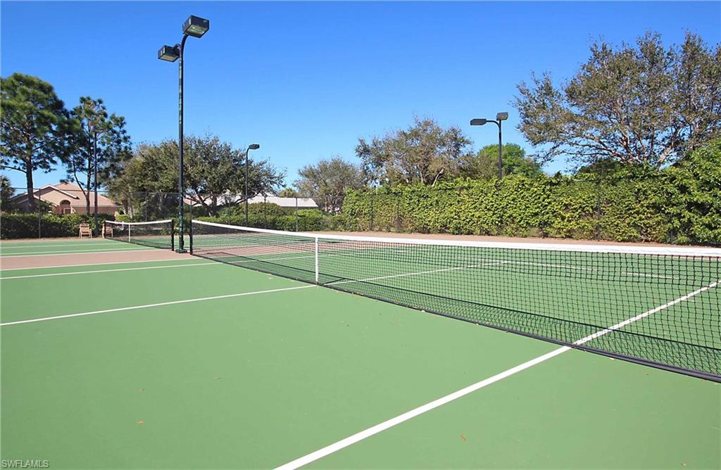 6545 Chestnut Circle Naples, FL 34109 - Photo 40 of 43 a view of a tennis court