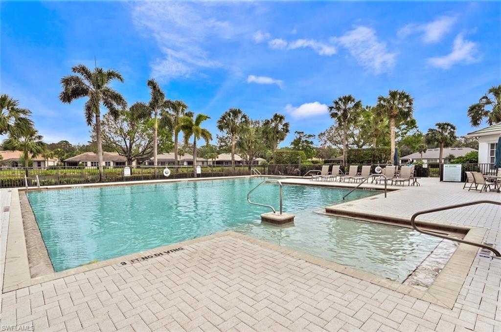 6545 Chestnut Circle Naples, FL 34109 - Photo 42 of 43 a view of a lake