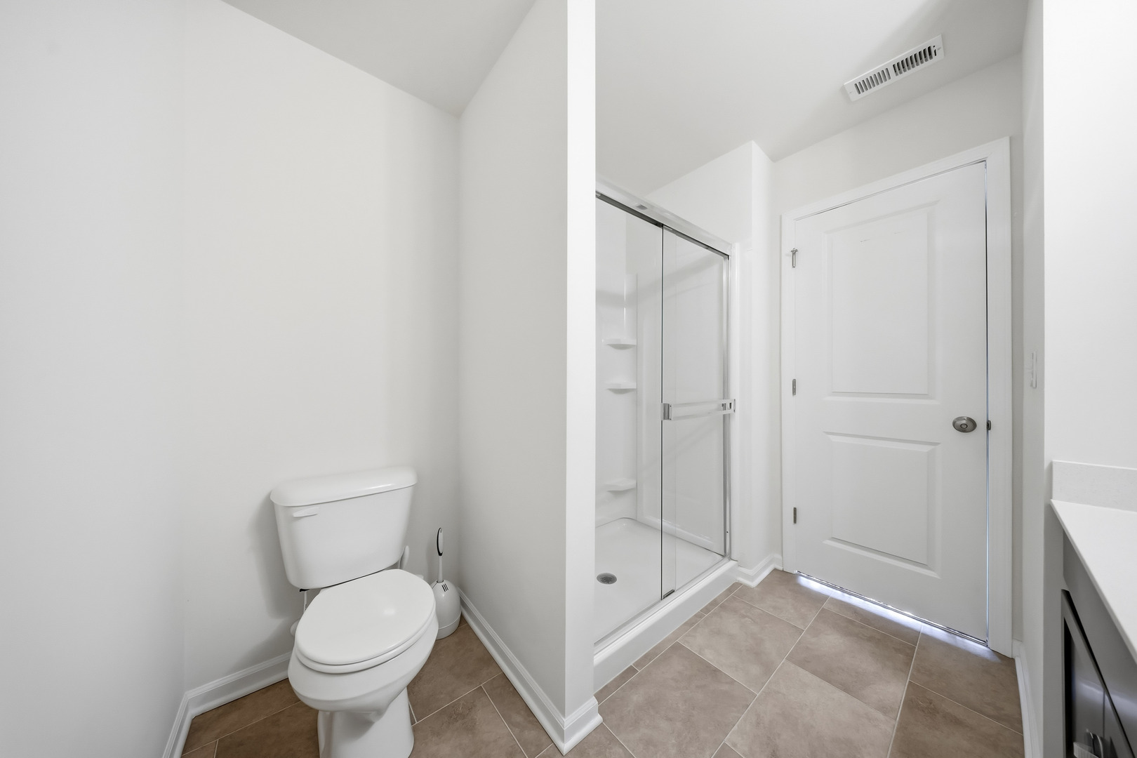 949 Hyte Street Plano, IL 60545 - Photo 26 of 51 a bathroom with a granite countertop toilet a sink and a mirror