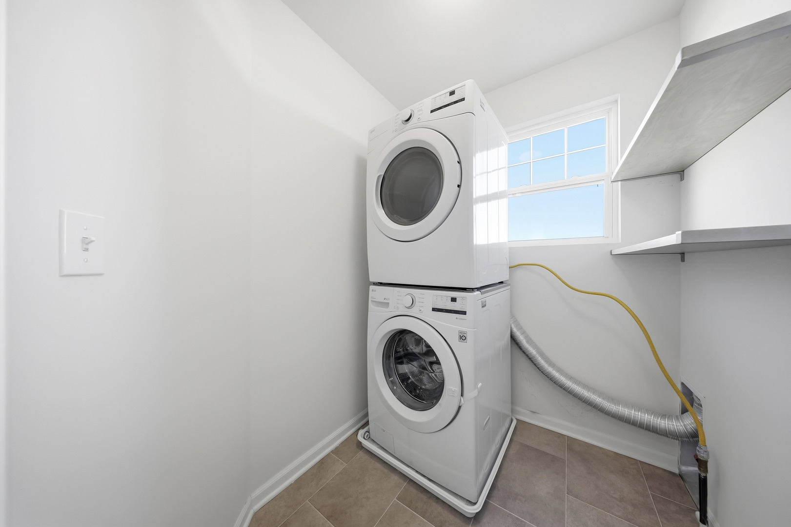 949 Hyte Street Plano, IL 60545 - Photo 30 of 51 a utility room with dryer and washer