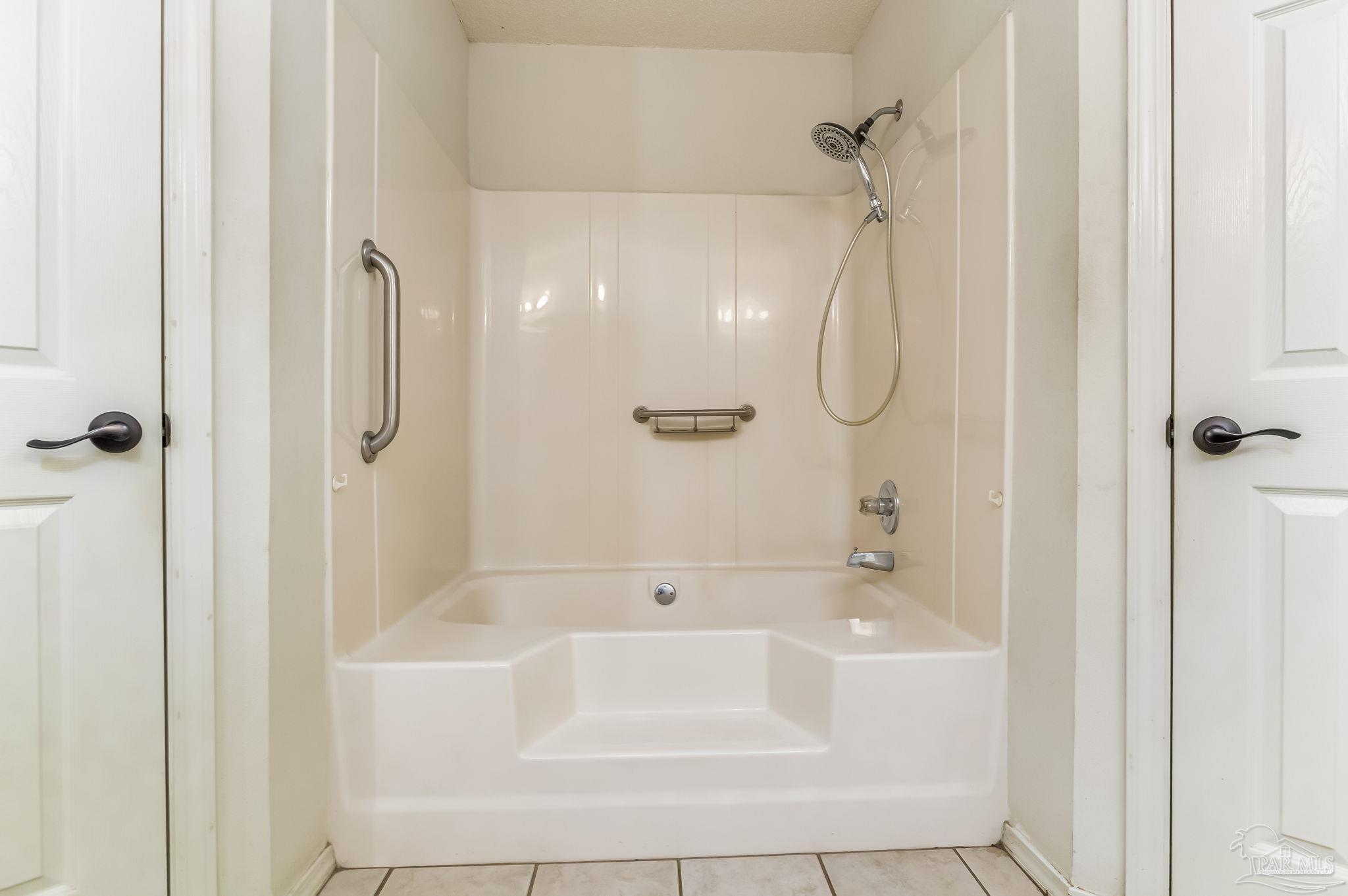 5503 Chantilly Circle Milton, FL 32583 - Photo 15 of 21 a bathroom with a bathtub