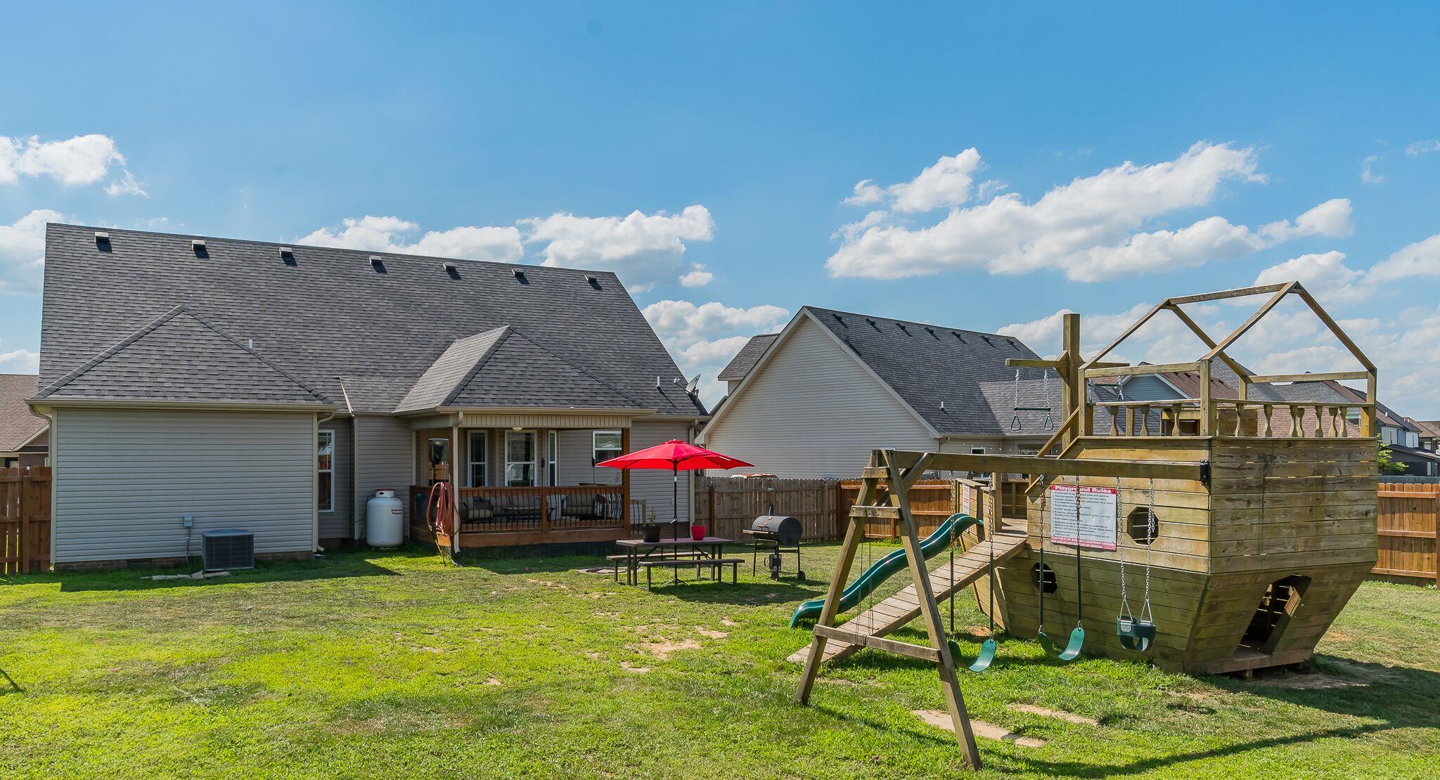 1753 Springhaven Drive Clarksville, TN 37042 - Photo 17 of 18 a view of a house with backyard