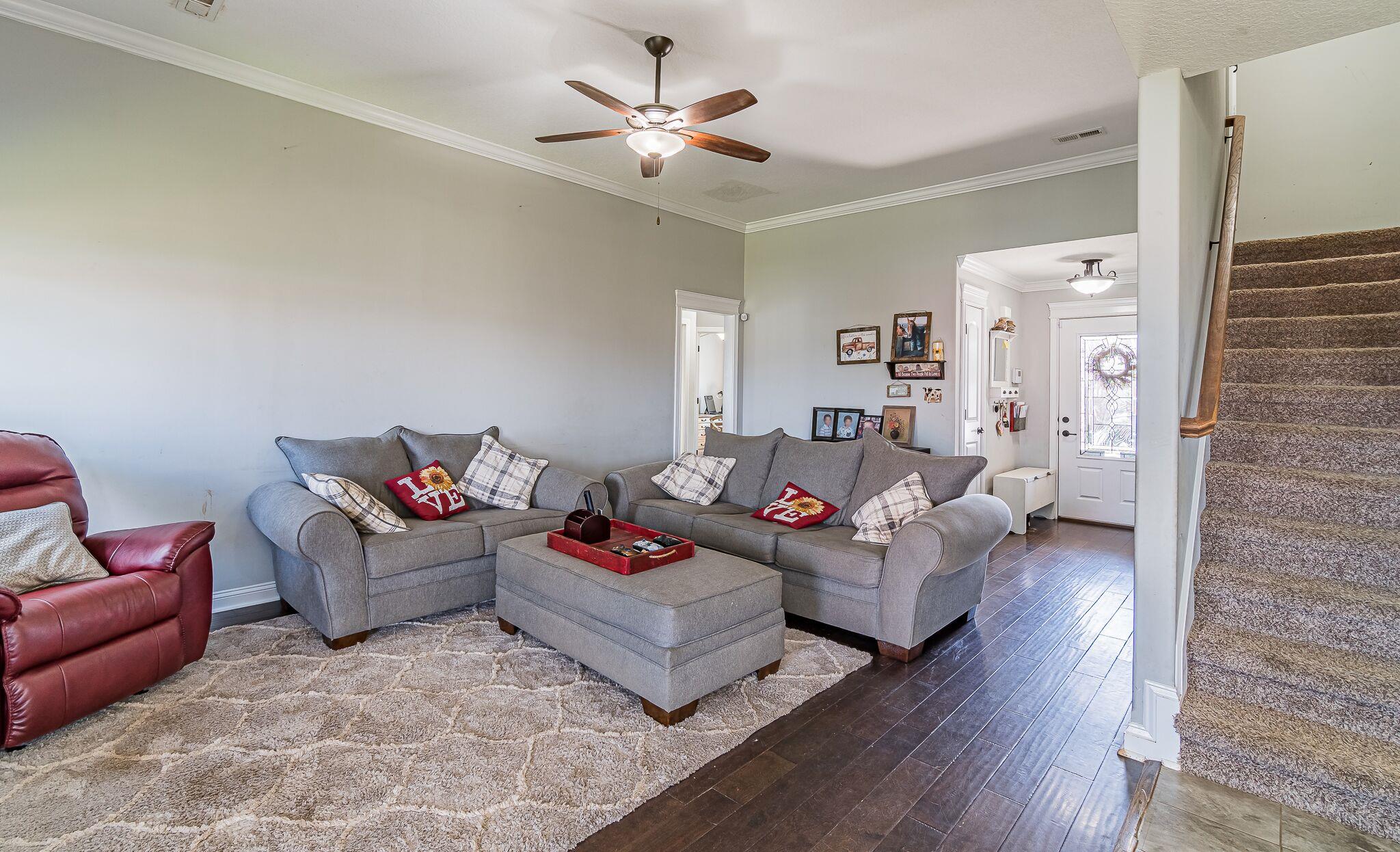 1753 Springhaven Drive Clarksville, TN 37042 - Photo 2 of 18 a living room with furniture and wooden floor