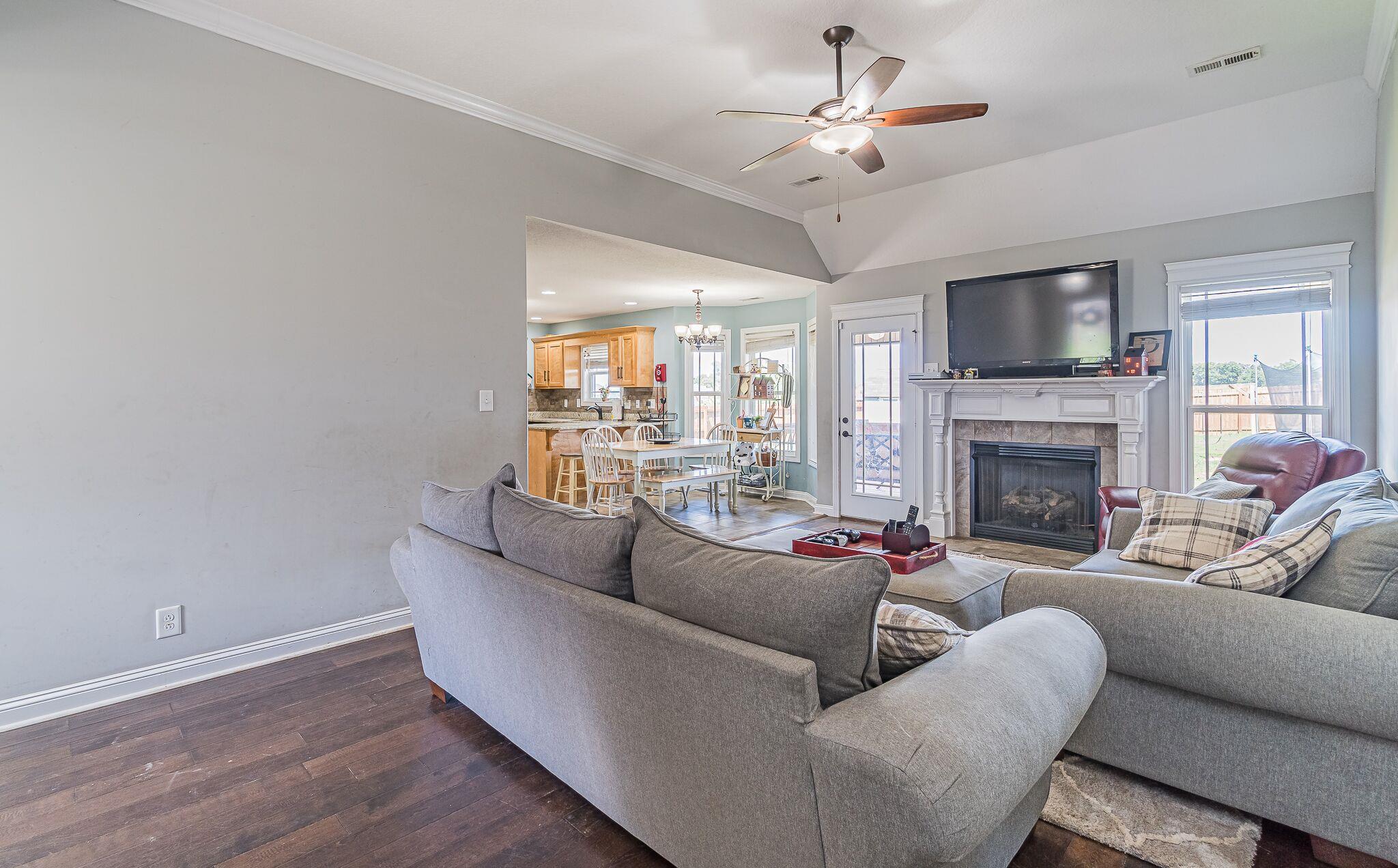 1753 Springhaven Drive Clarksville, TN 37042 - Photo 3 of 18 a living room with furniture and a fireplace
