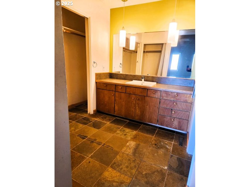 68766 Weatherford Road Arlington, OR 97812 - Photo 19 of 27 a bathroom with a sink and a mirror