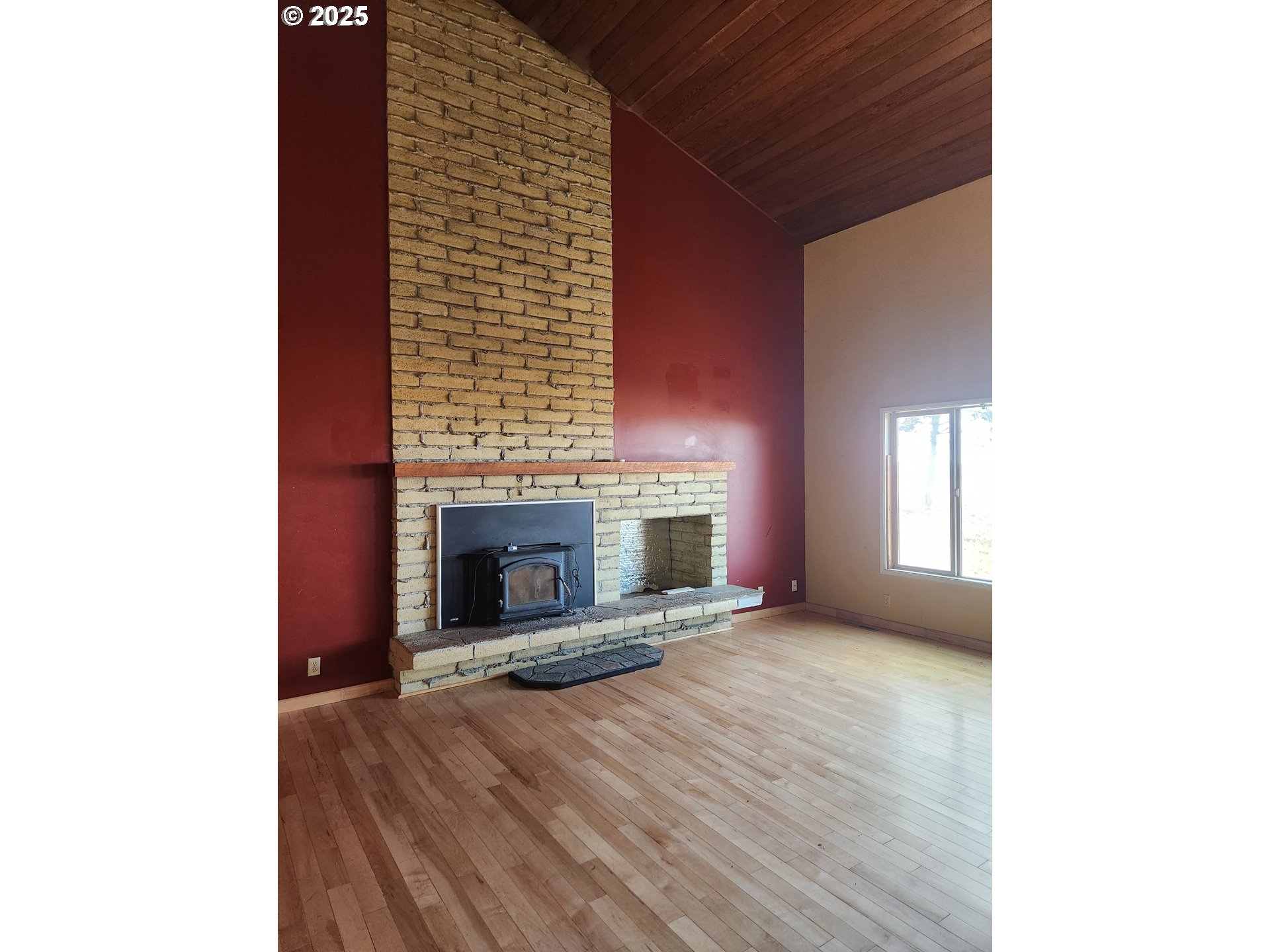 68766 Weatherford Road Arlington, OR 97812 - Photo 23 of 27 a view of an empty room with a fireplace