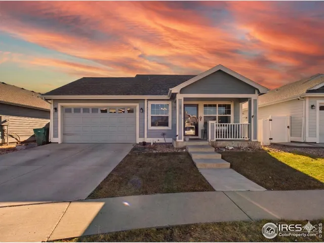 a front view of a house with yard
