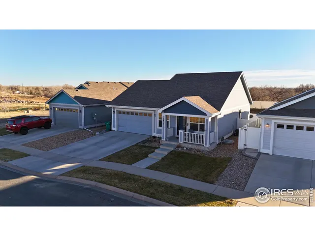 a black and white photo of a house