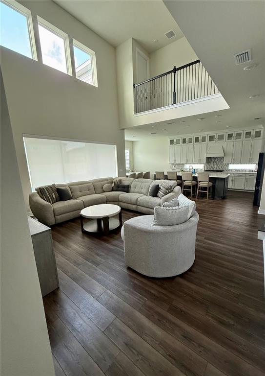 8441 Pk Clf Way Orlando, FL 32836 - Photo 10 of 59 a living room with furniture and kitchen view
