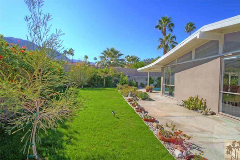 71705 Tunis Road Rancho Mirage, CA 92270 - Photo 27 of 29 a view of a house with a yard