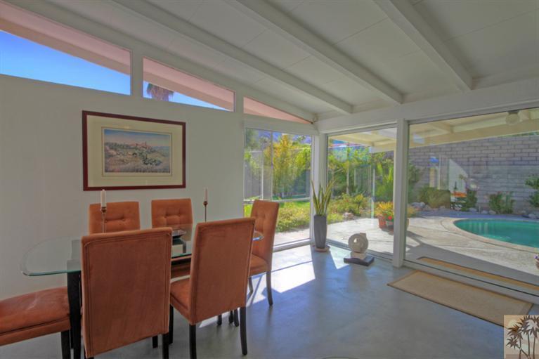 71705 Tunis Road Rancho Mirage, CA 92270 - Photo 10 of 29 a living room with furniture and a large window