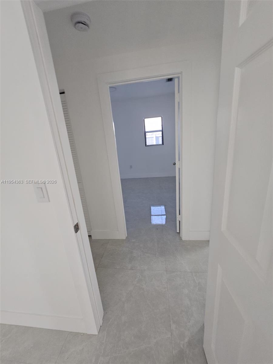 1148 Northwest 100th Street, Unit 1 Miami, FL 33150 - Photo 12 of 32 a view of empty room