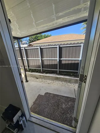 a living room with a couch and a flat screen tv