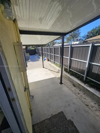 a view of house with outdoor space and porch